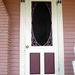 This storm door was made with an oval design to match the interior door we also created (found on our solid doors page)