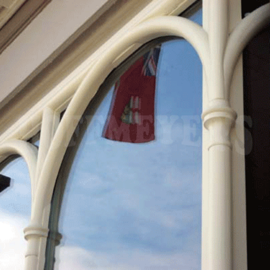 Painted arch detail view of an installed window