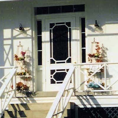 An unique combination door with true divided irregular shaped lights now in Mystic, Connecticut. The lower portion of the door has a solid panel that can be switched out during the winter